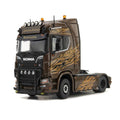die cast model of a Scania  truck in black amber  livery made by IMC in 1/50 scale