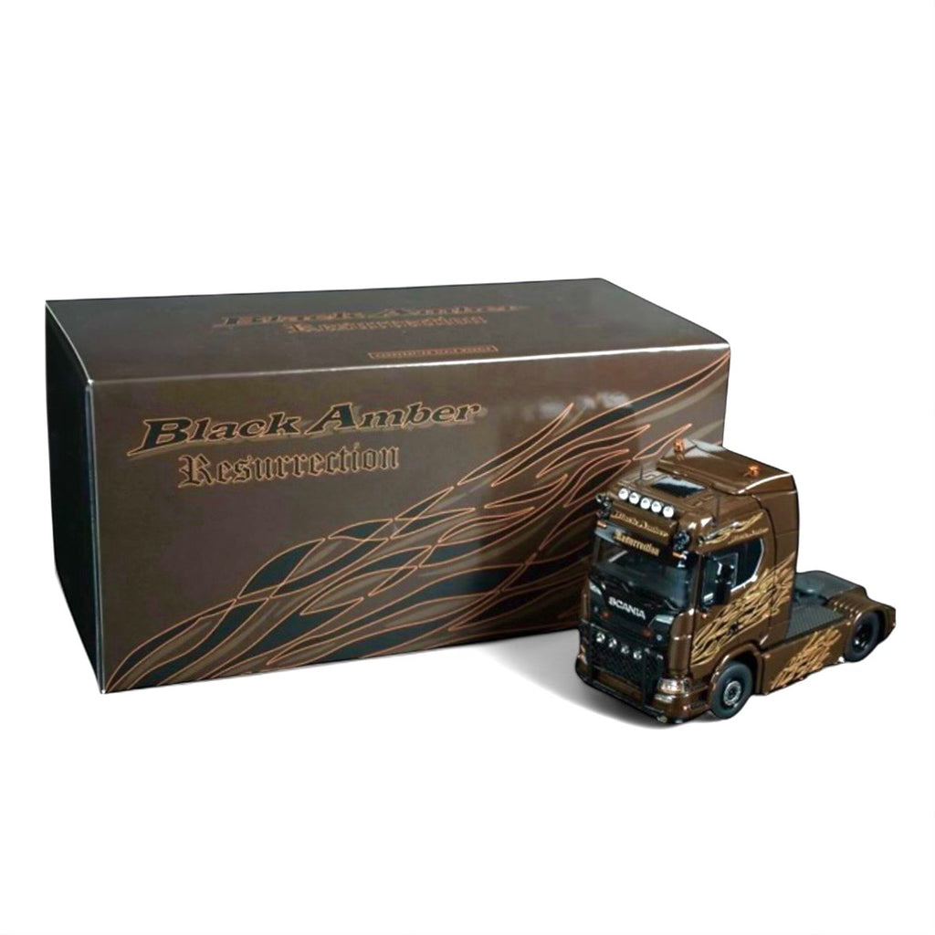 die cast model of a Scania  truck in black amber  livery made by IMC in 1/50 scale
