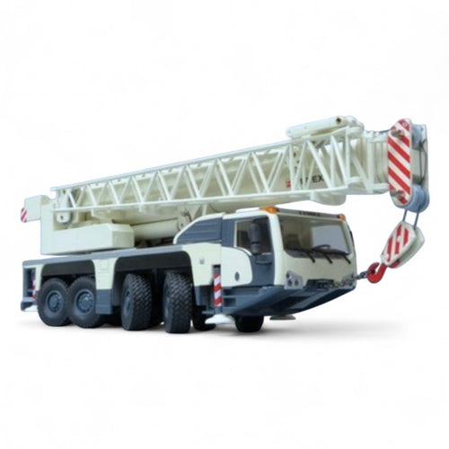 die cast model of a white crane Demag ac100/4 L  made by Conrad in 1/50 scale