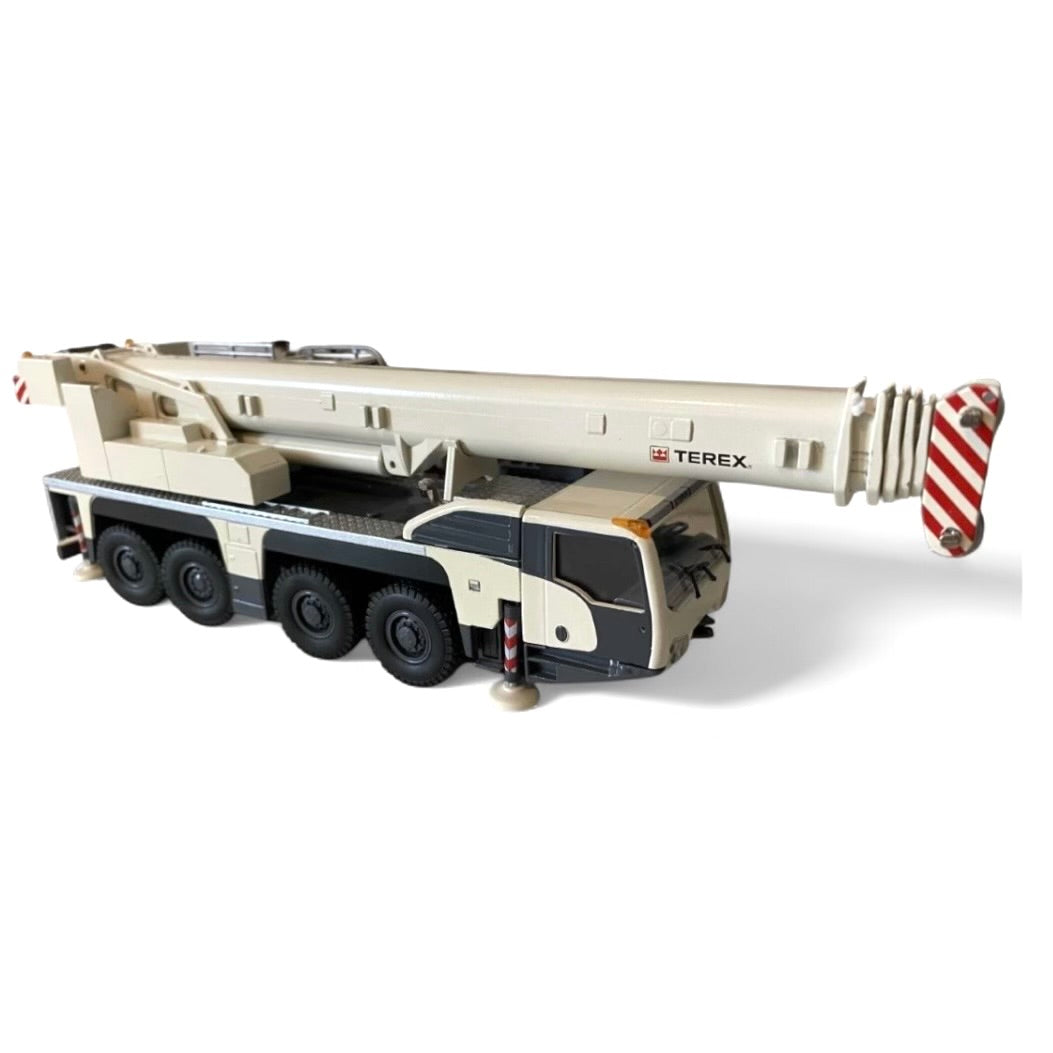die cast model of a white crane Demag ac100/4 L  made by Conrad in 1/50 scale