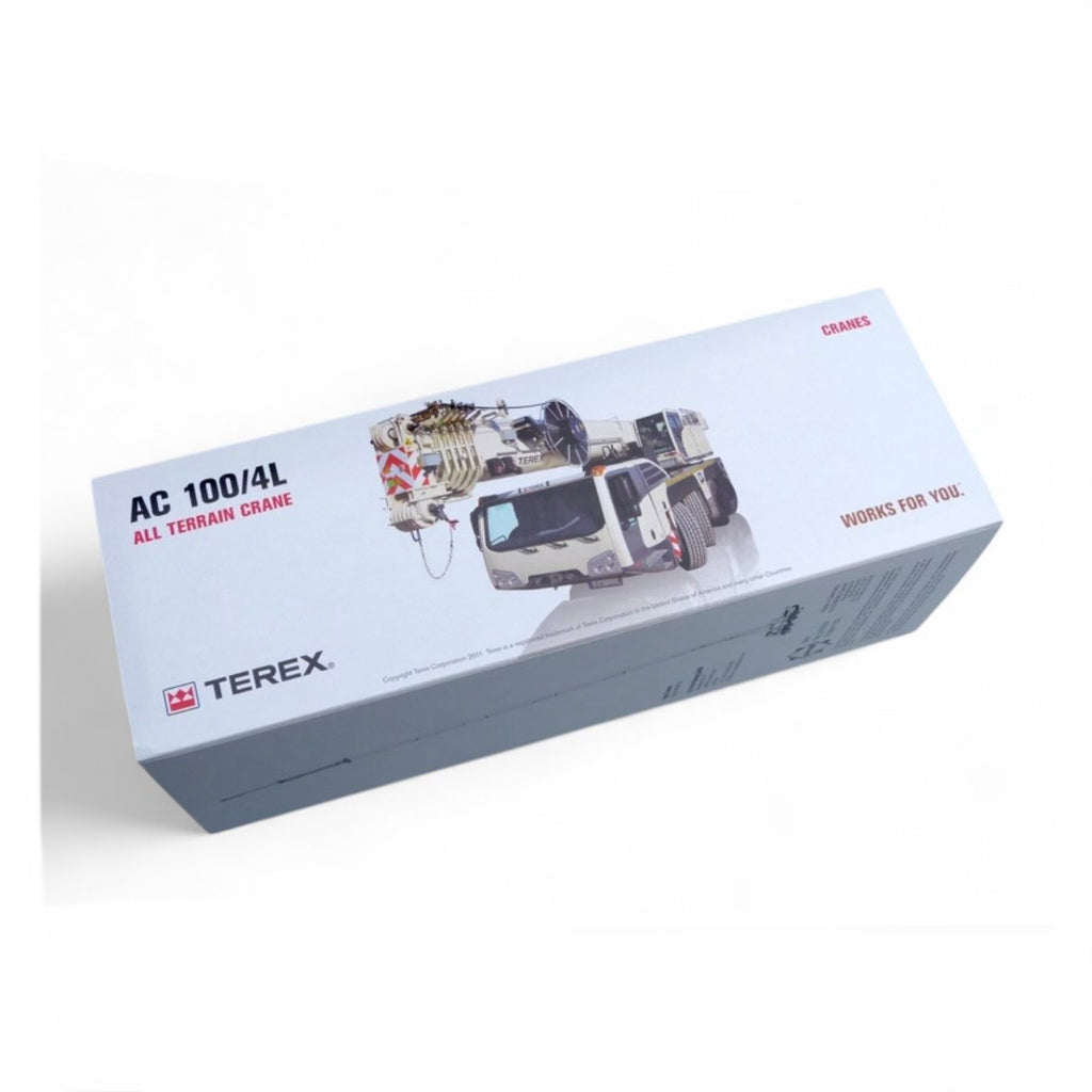 die cast model of a white crane Demag ac100/4 L  made by Conrad in 1/50 scale