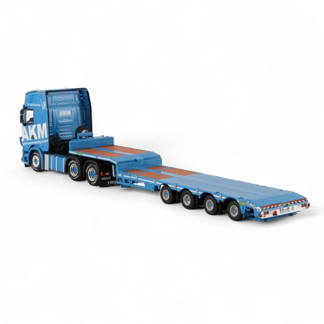 die cast model of a Scania lo loader truck in the livery of AKM made by WSI  in 1/50 scale