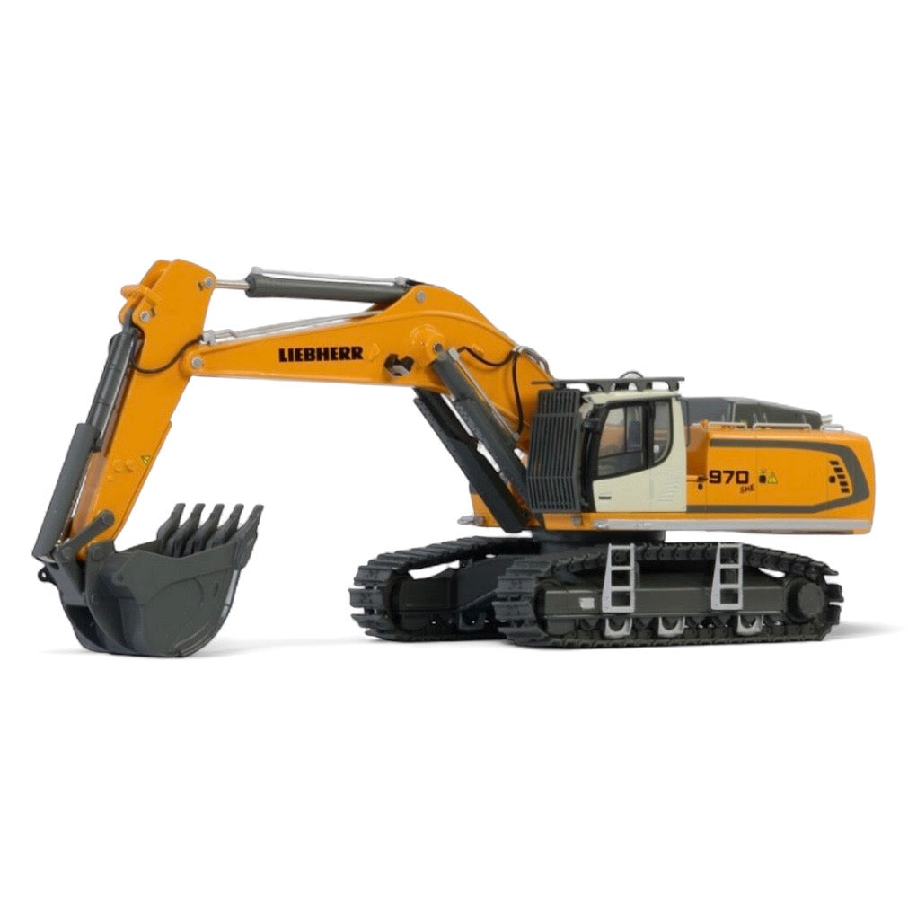Side profile of WSI Liebherr R970 SME excavator showing tracks and boom"
