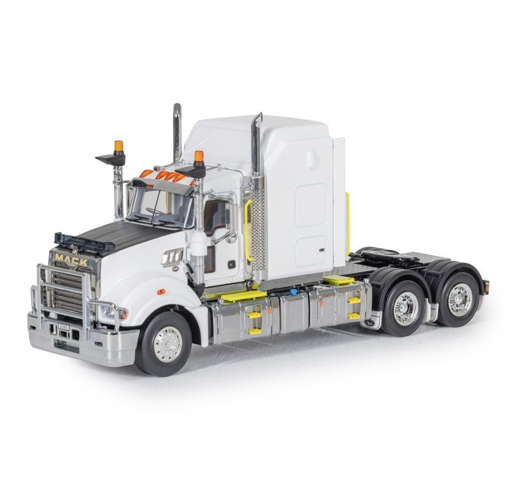 A detailed model of a Mack semi-truck cab with a white sleeper, chrome and silver front end, black wheels, and small orange and yellow accents, shown on a clean white background.