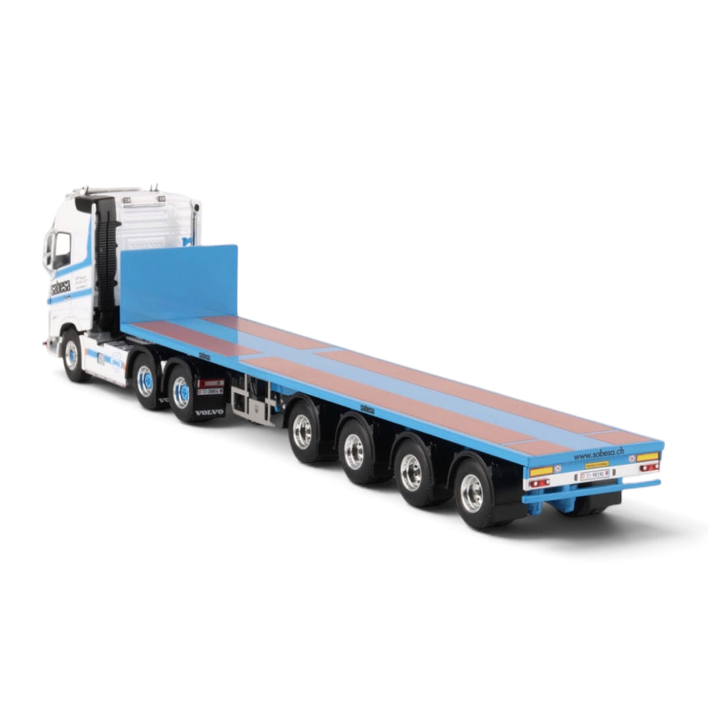 WSI Sabesa SA (Switzerland) Volvo FH5 Globetrotter 6x4 with 4-Axle Flatbed Trailer rear side view